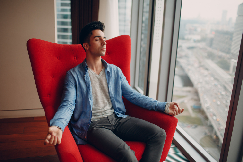 Man meditation armchair